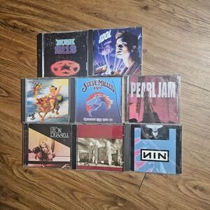 Lot of 8 Classic Rock CDs U2 Rush Pearl Jam NIN Billy Idol Steve Miller Band STP